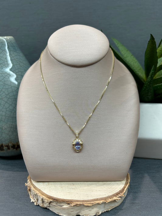 10k Yellow Gold Oval Tanzanite Halo Pendant