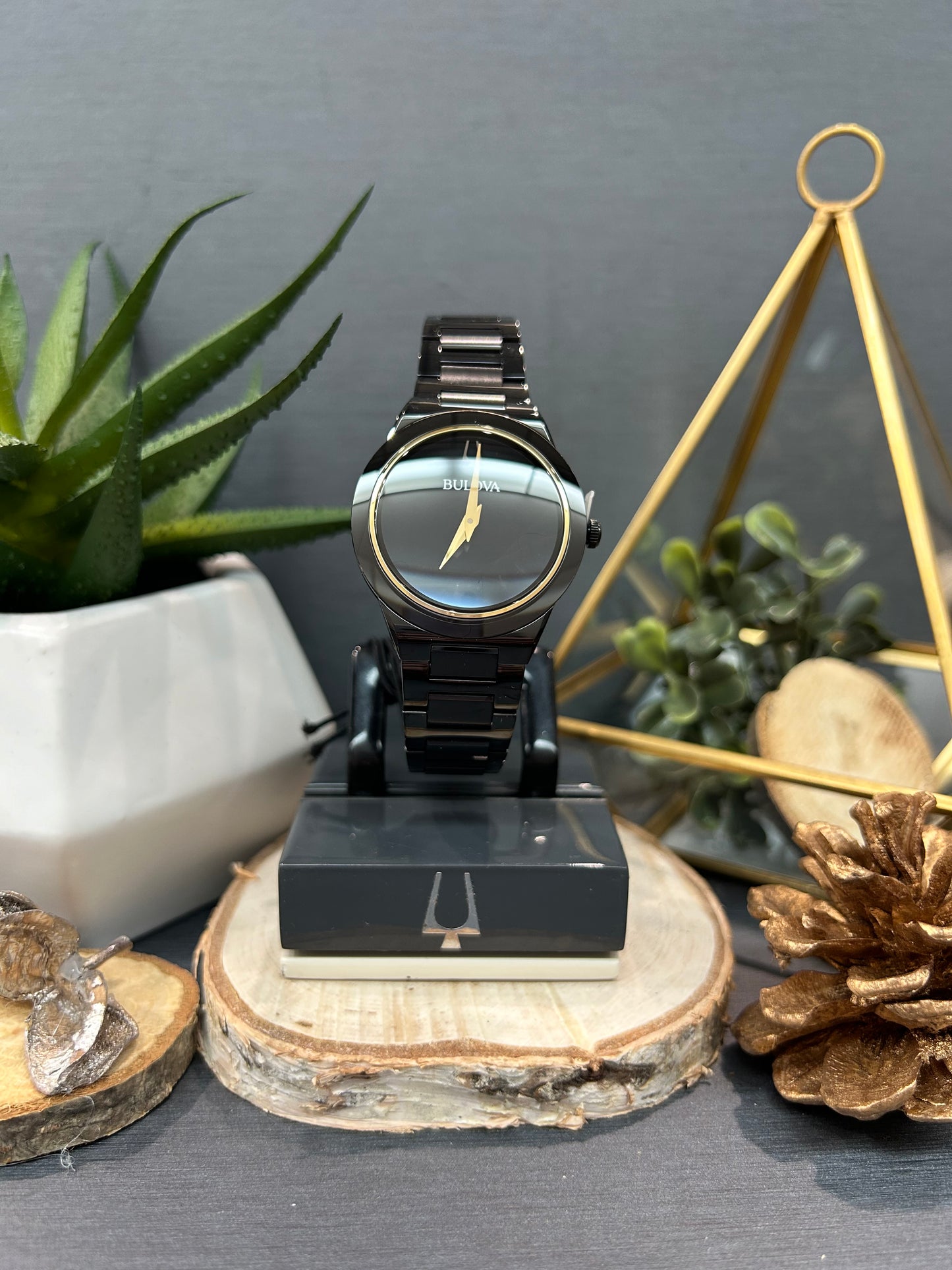 Women's Bulova Gold Dial Plain Black Face Watch with Metal Band