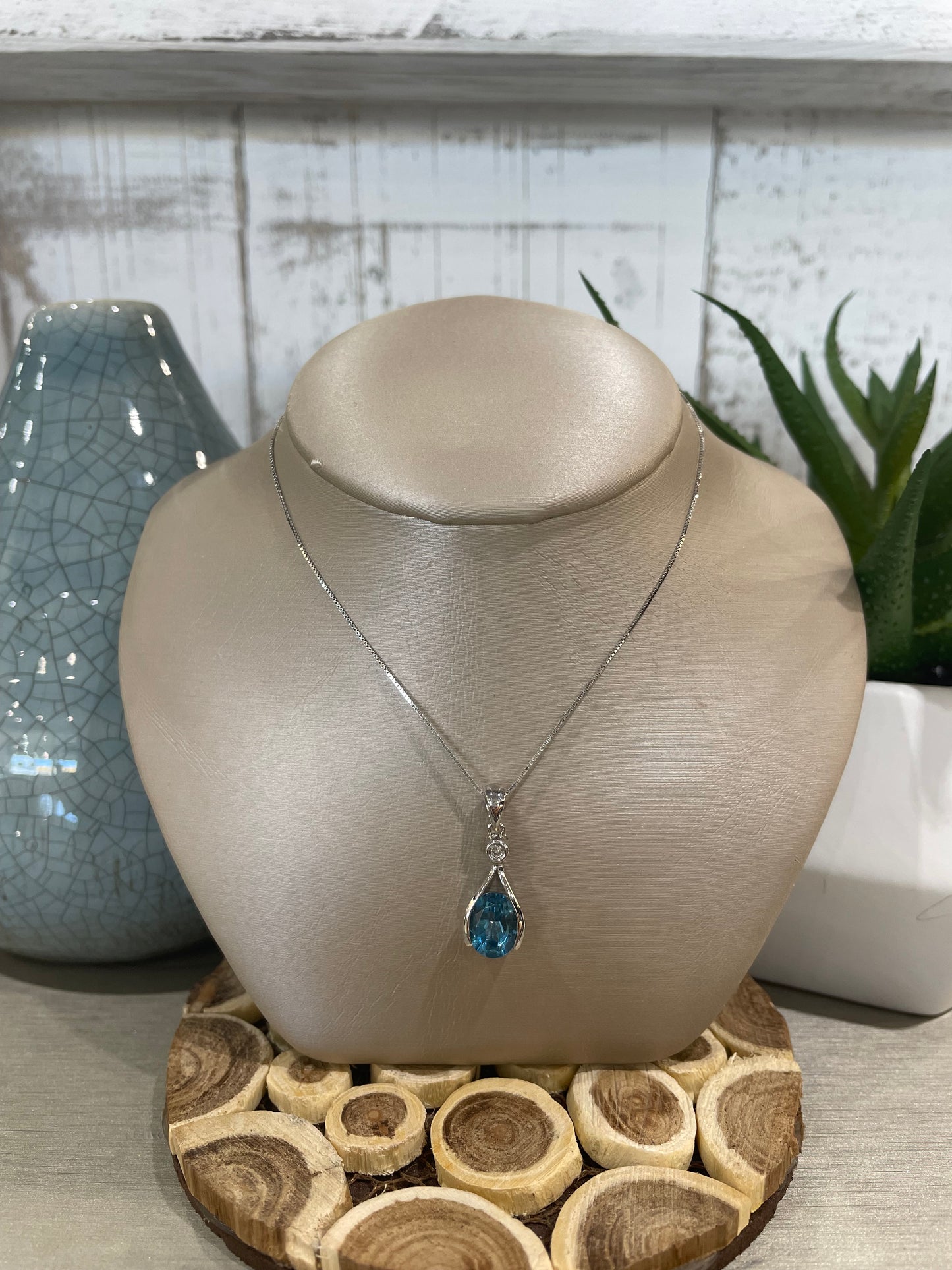 10k White Gold Oval Blue Topaz Pendant