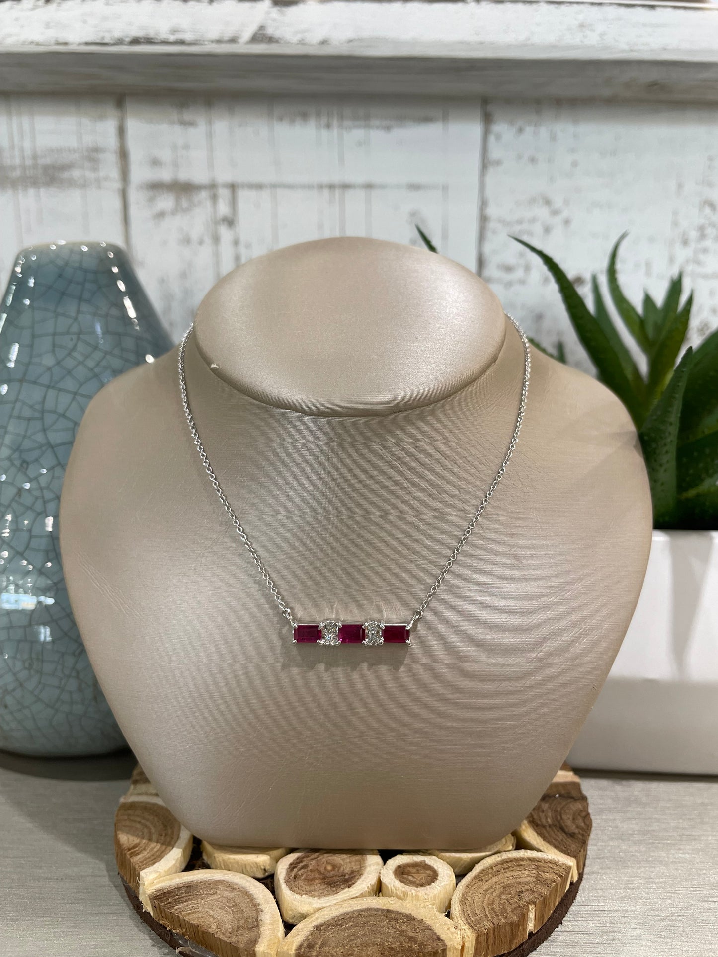 14k White Gold Emerald Cut Three Stone Ruby Pendant