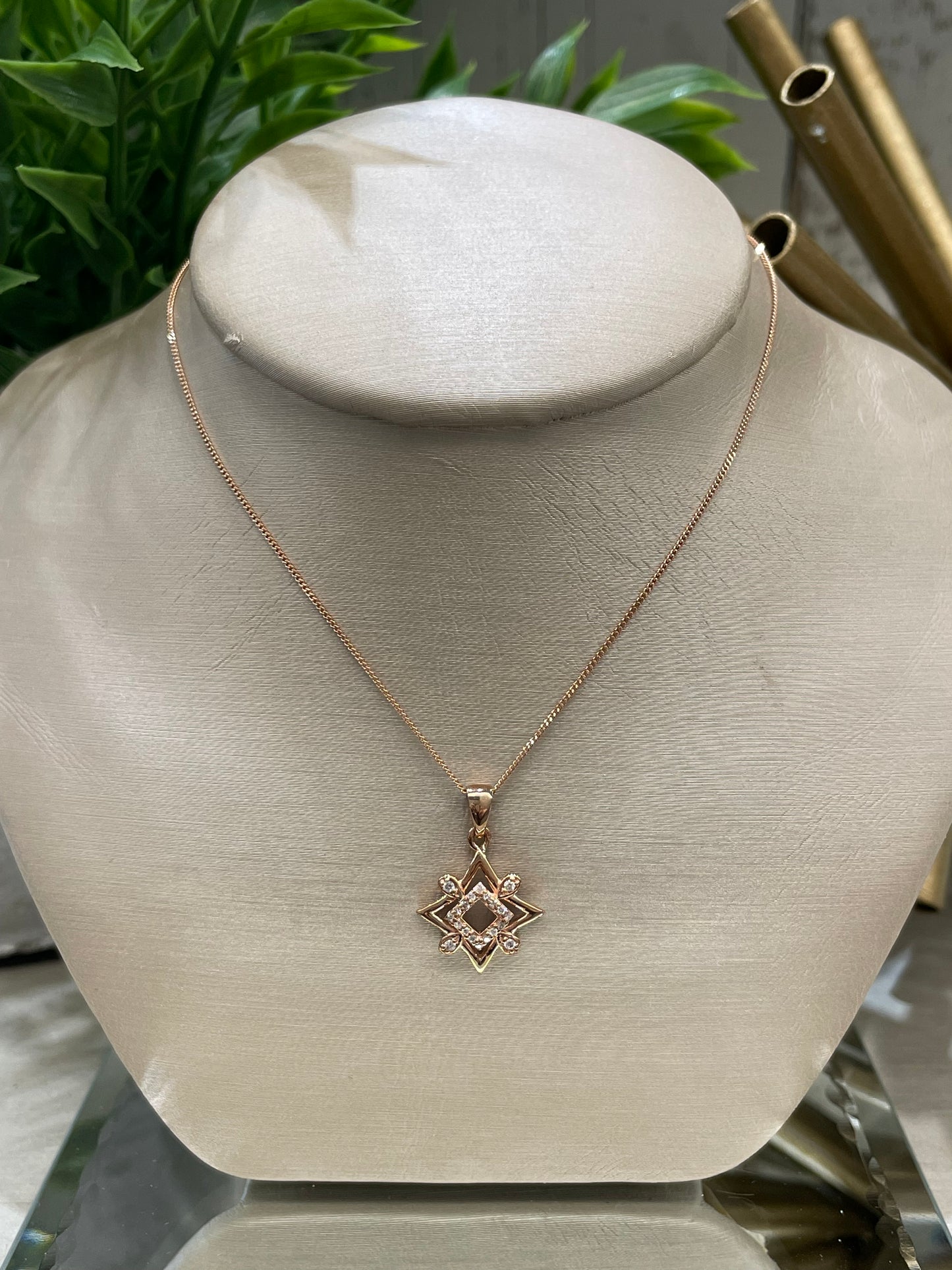10k Rose Gold 0.08ctw Diamond Fancy Star Pendant