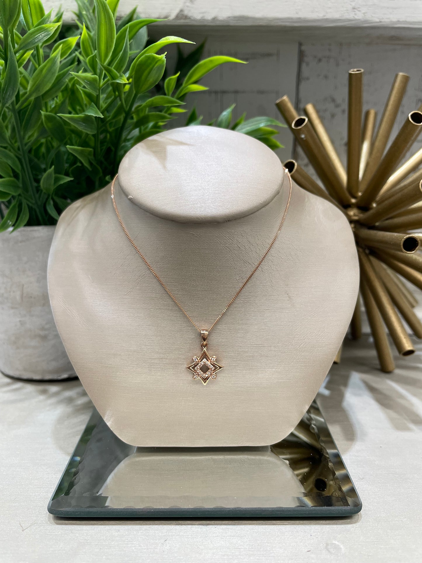 10k Rose Gold 0.08ctw Diamond Fancy Star Pendant