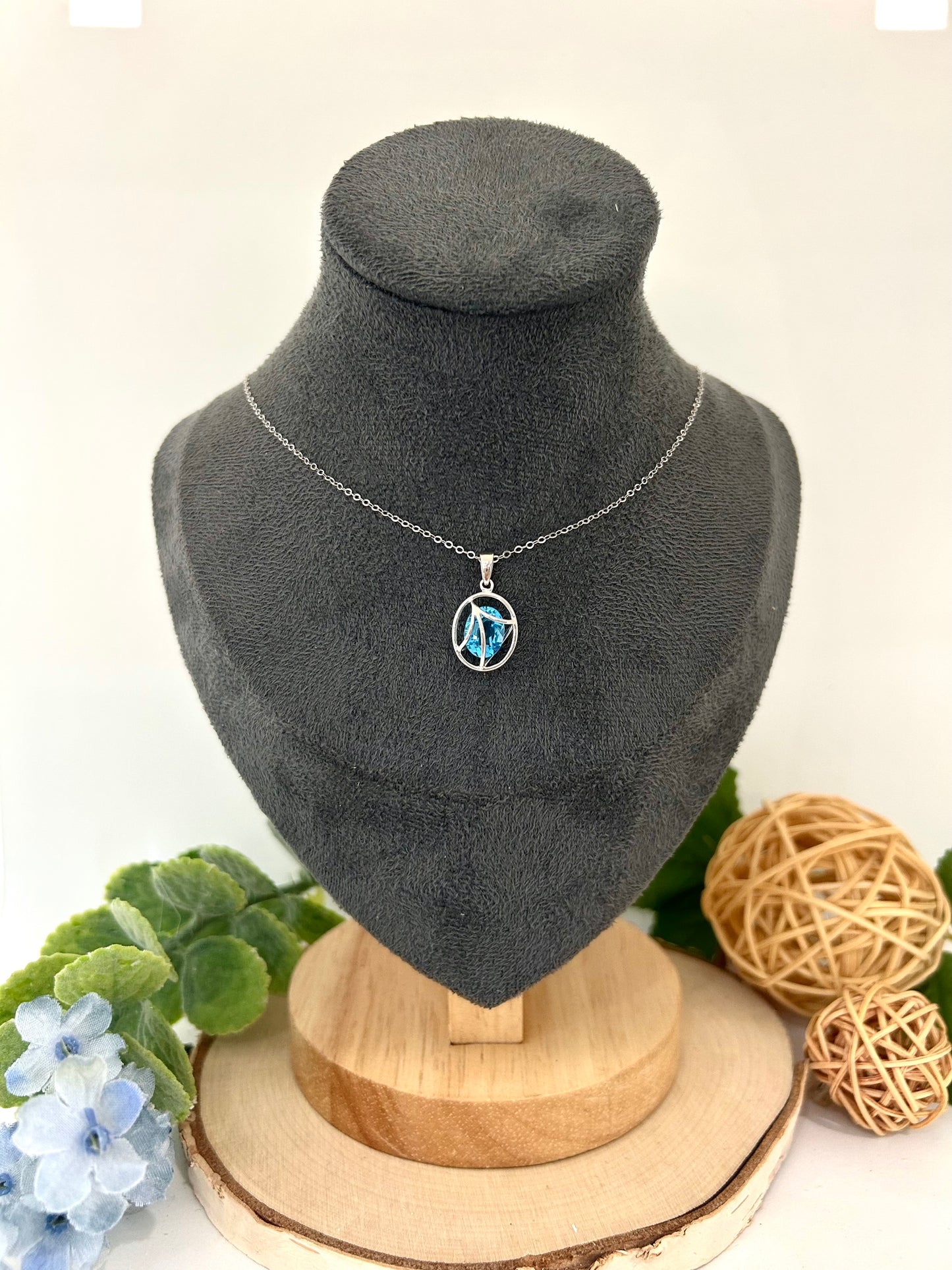 10k White Gold Oval Blue Topaz Bezel Design Pendant